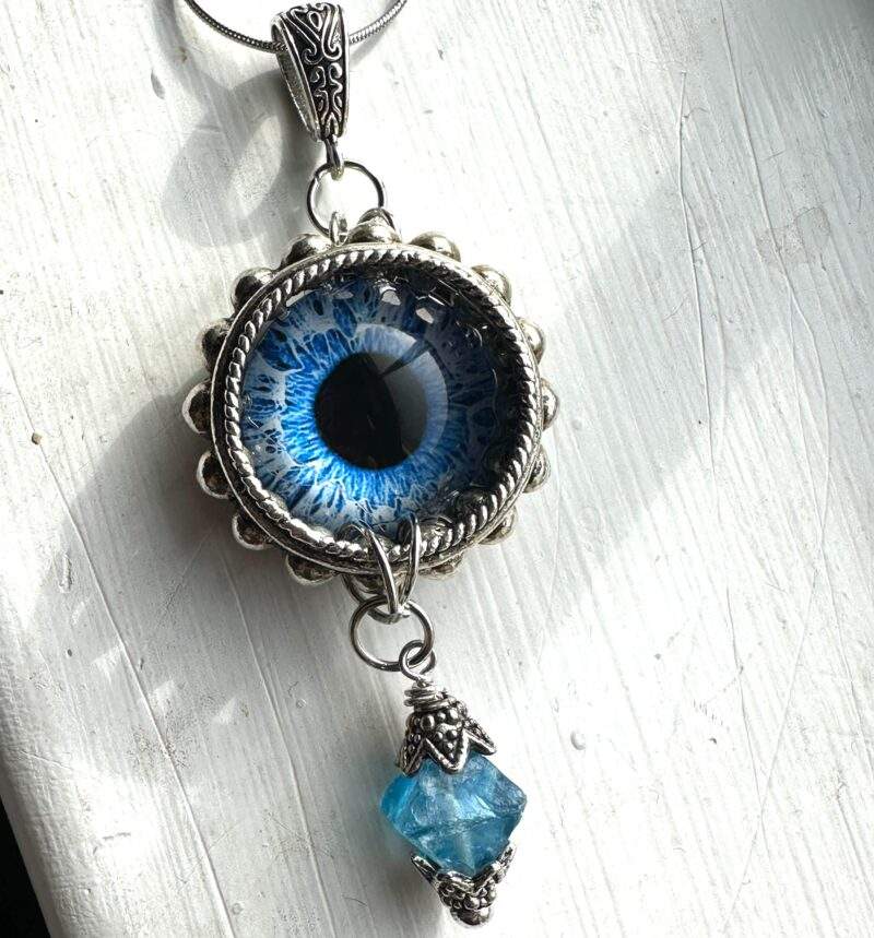 Light blue dragon eye with a blue quartz drop necklace