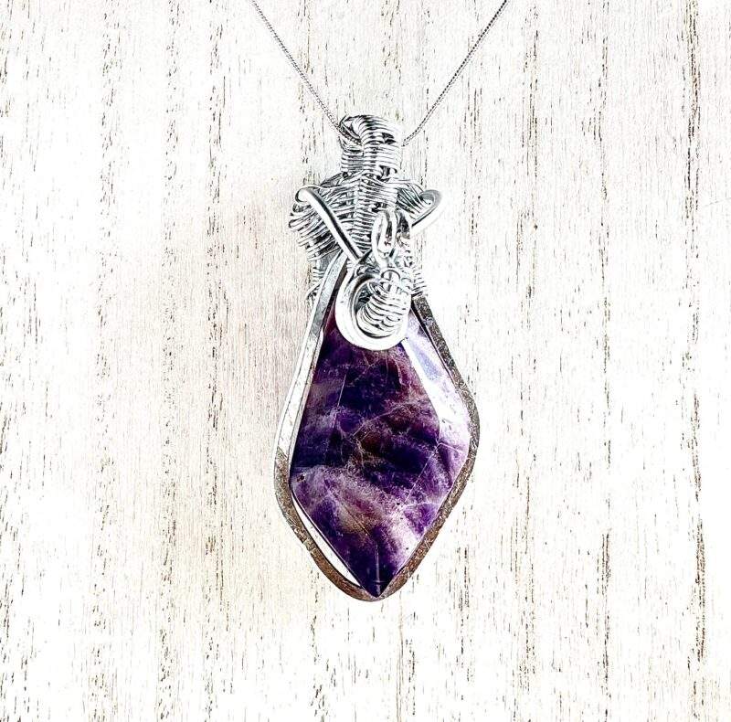 Wire wrapped banded amethyst kite shaped necklace