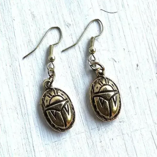 Domed brass scarab earrings